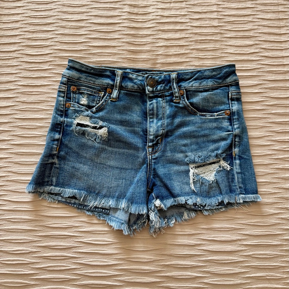 American Eagle Outfitters Next Level Stretch  Blue Distressed Jean Shorts Size 4